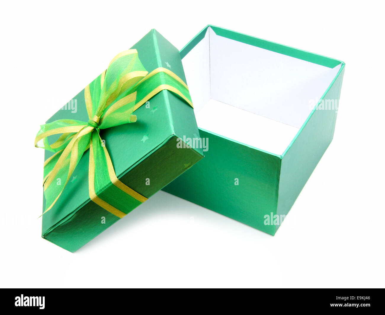Opened green gift box with lid and ribbon over white Stock Photo Alamy