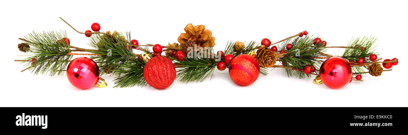 Long horizontal Christmas border with baubles, tree branches and berries Stock Photo