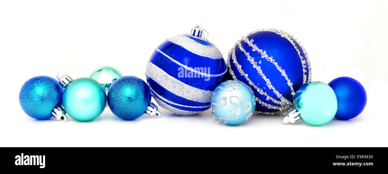 Group Of Blue Christmas Baubles Arranged As A Border Over