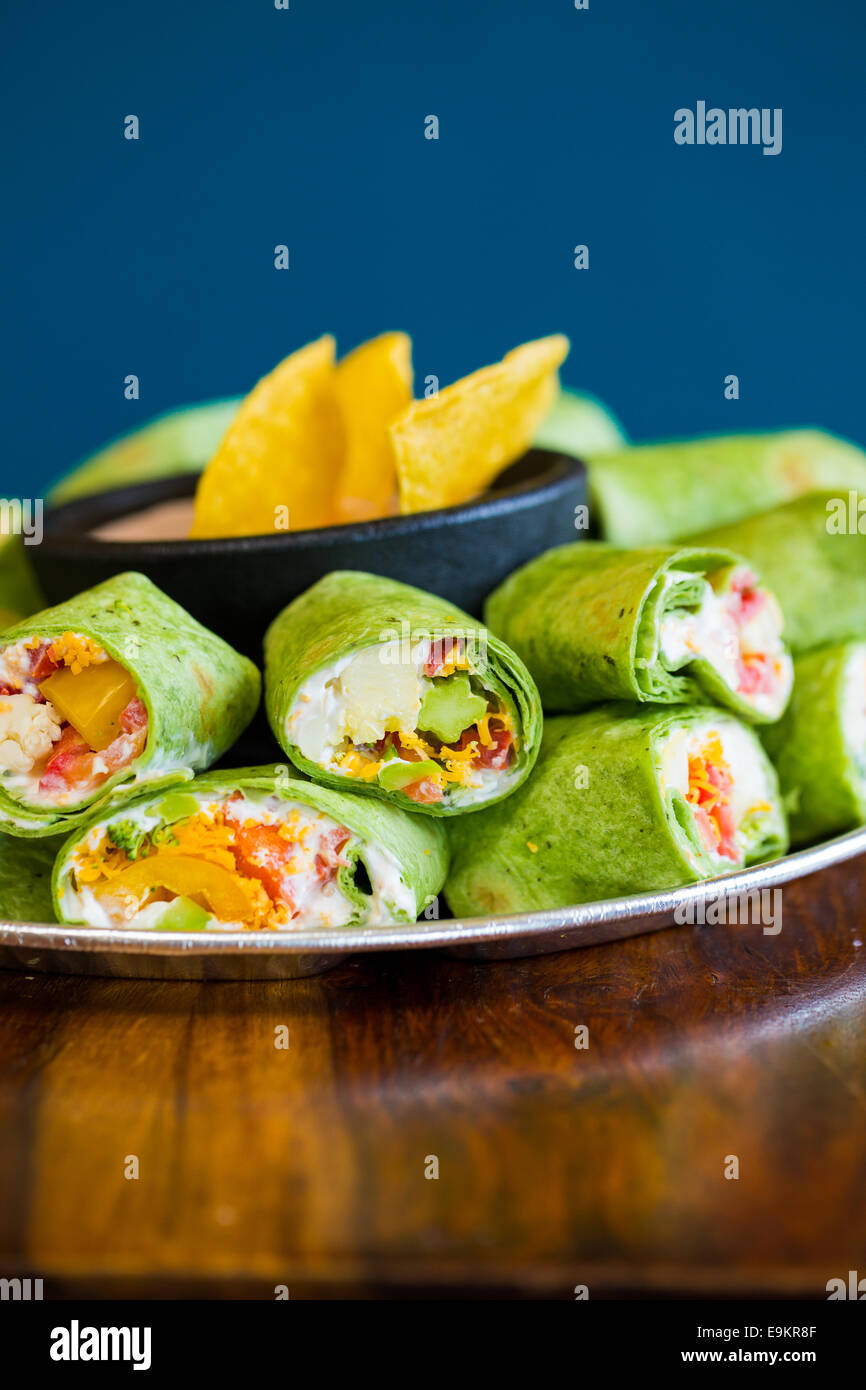 Mexican restaurant offering a gluten-free alternative to their traditional cuisine with these vegan veggie vegetarian wraps. Stock Photo