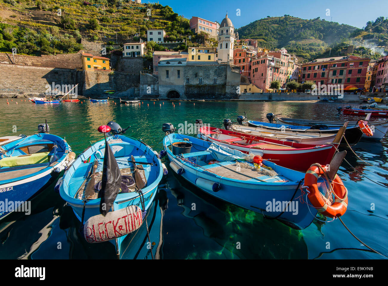 Moored fishing boats in the small port of Vernazza, Cinque Terre, Liguria, Italy Stock Photo