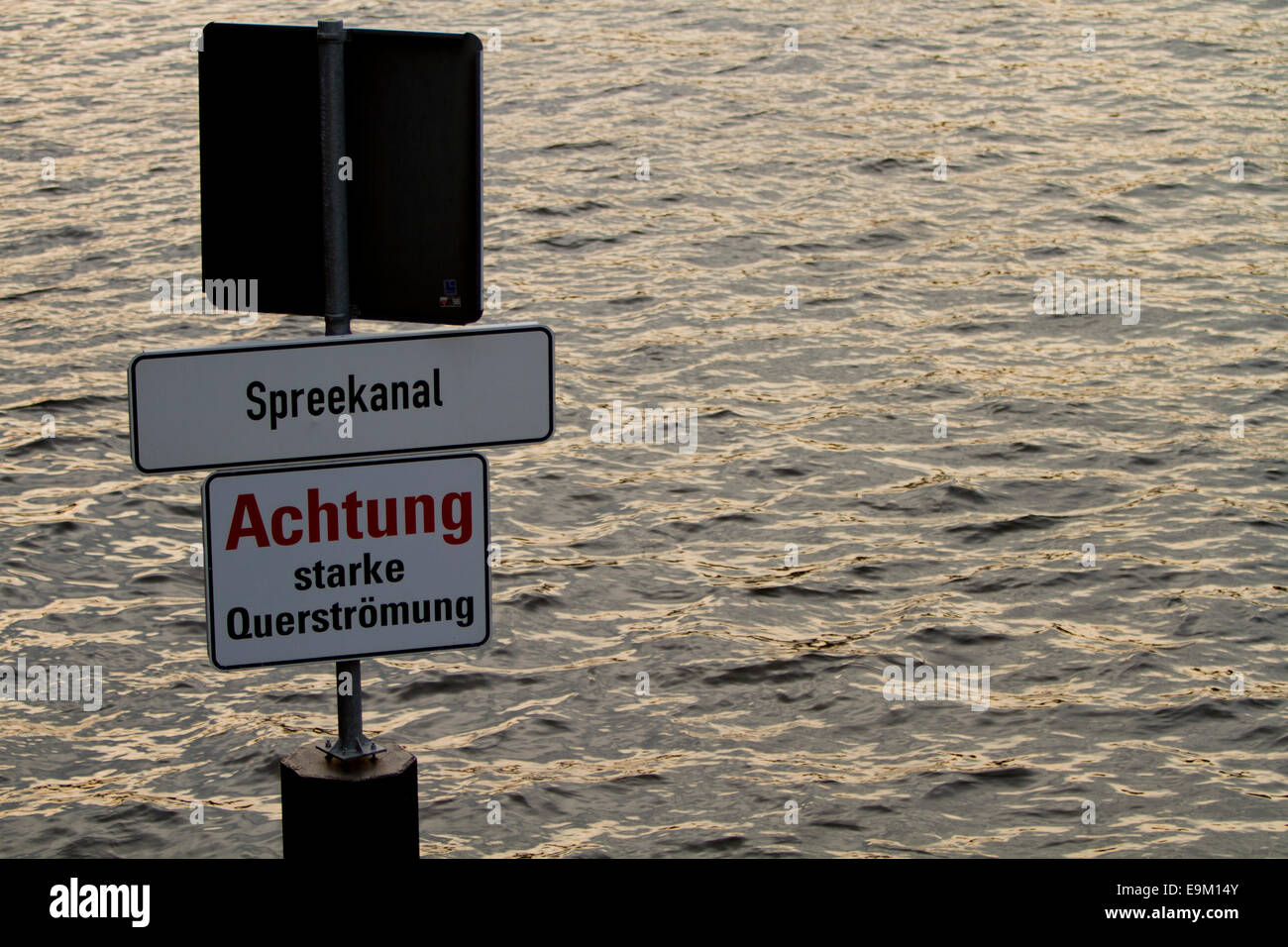 River in Germany warning sign danger old bridge Stock Photo