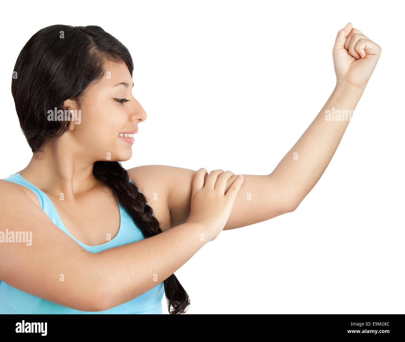 young sporty woman showing her biceps Stock Photo