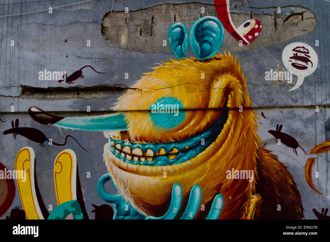 Graffiti street art Berlin Wall cartoon character Stock Photo