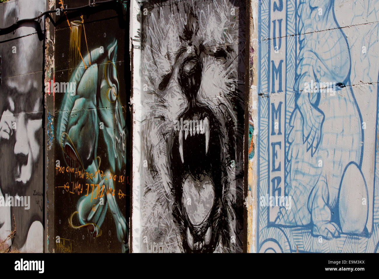 Graffiti street art Berlin Wall bear horse gallery Stock Photo