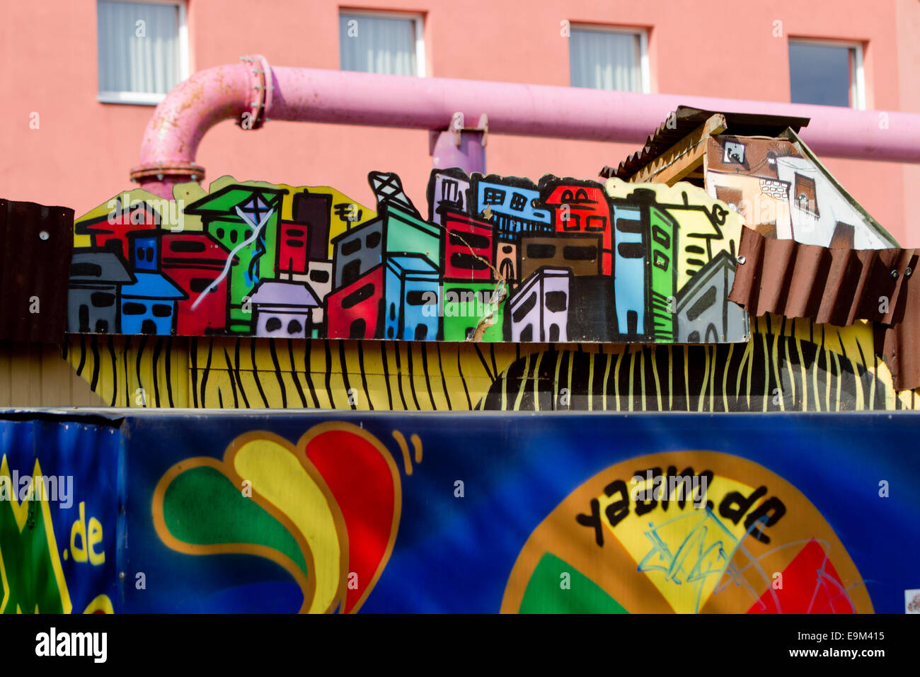 Graffiti street art Berlin Wall colour urban pipe Stock Photo