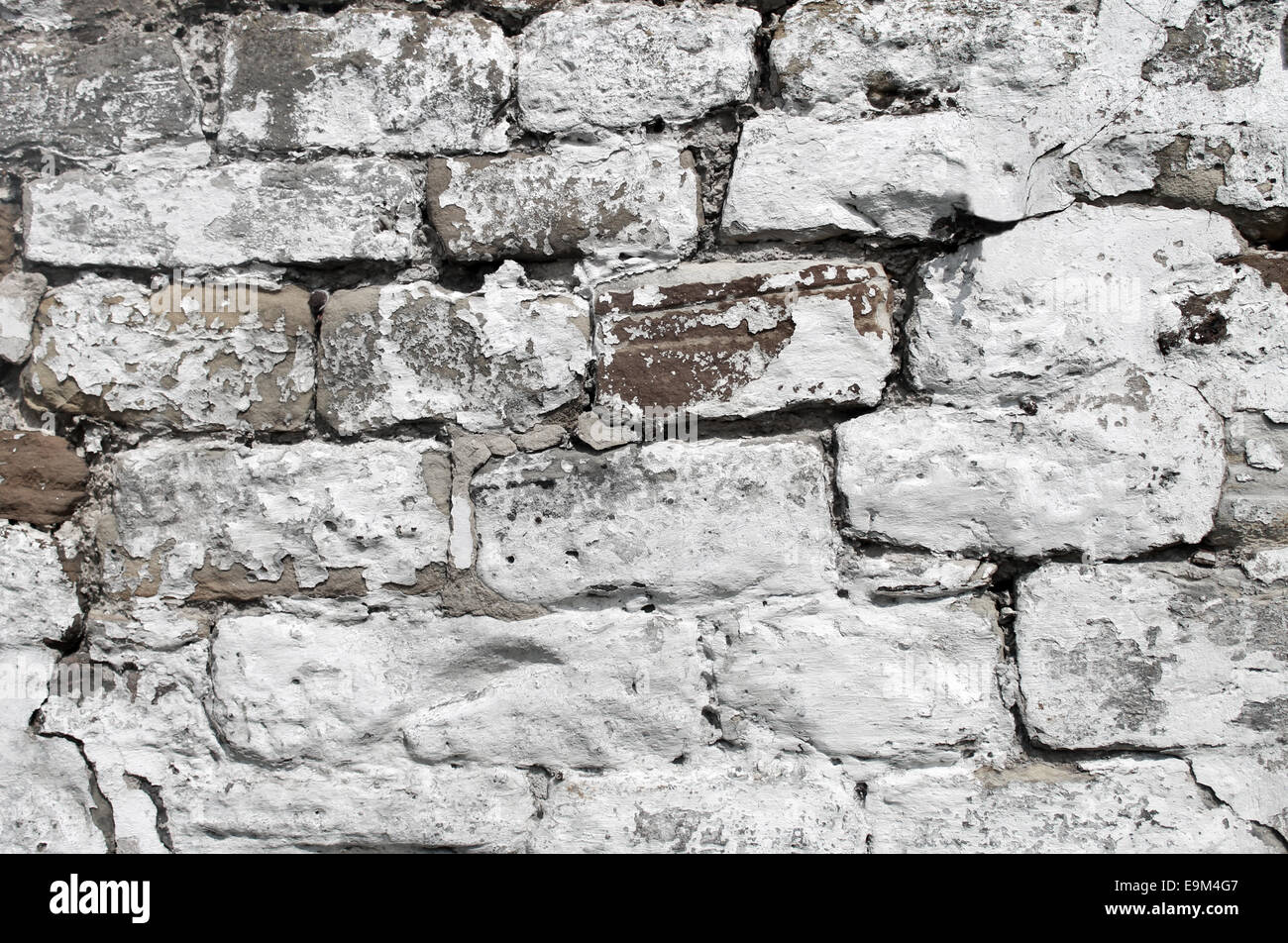 Abstract background of a painted white dry stone wall. Stock Photo