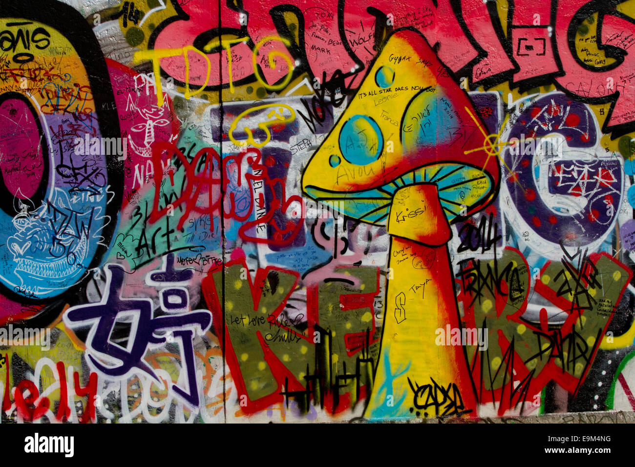 Graffiti street art Berlin Wall colour mushroom Stock Photo