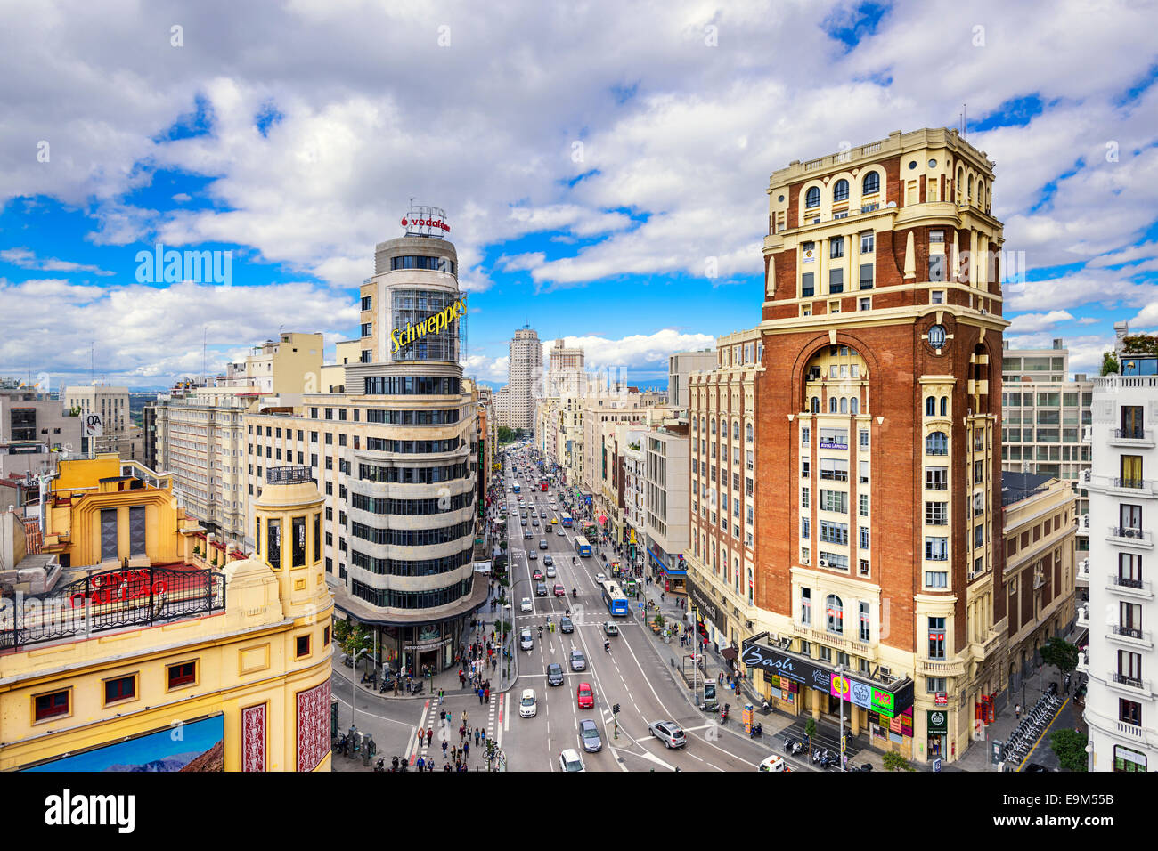 MADRID, SPAIN - OCTOBER 15, 2014: Gran Via at the Iconic Schweppes Building. The street is the main shopping district of Madrid. Stock Photo