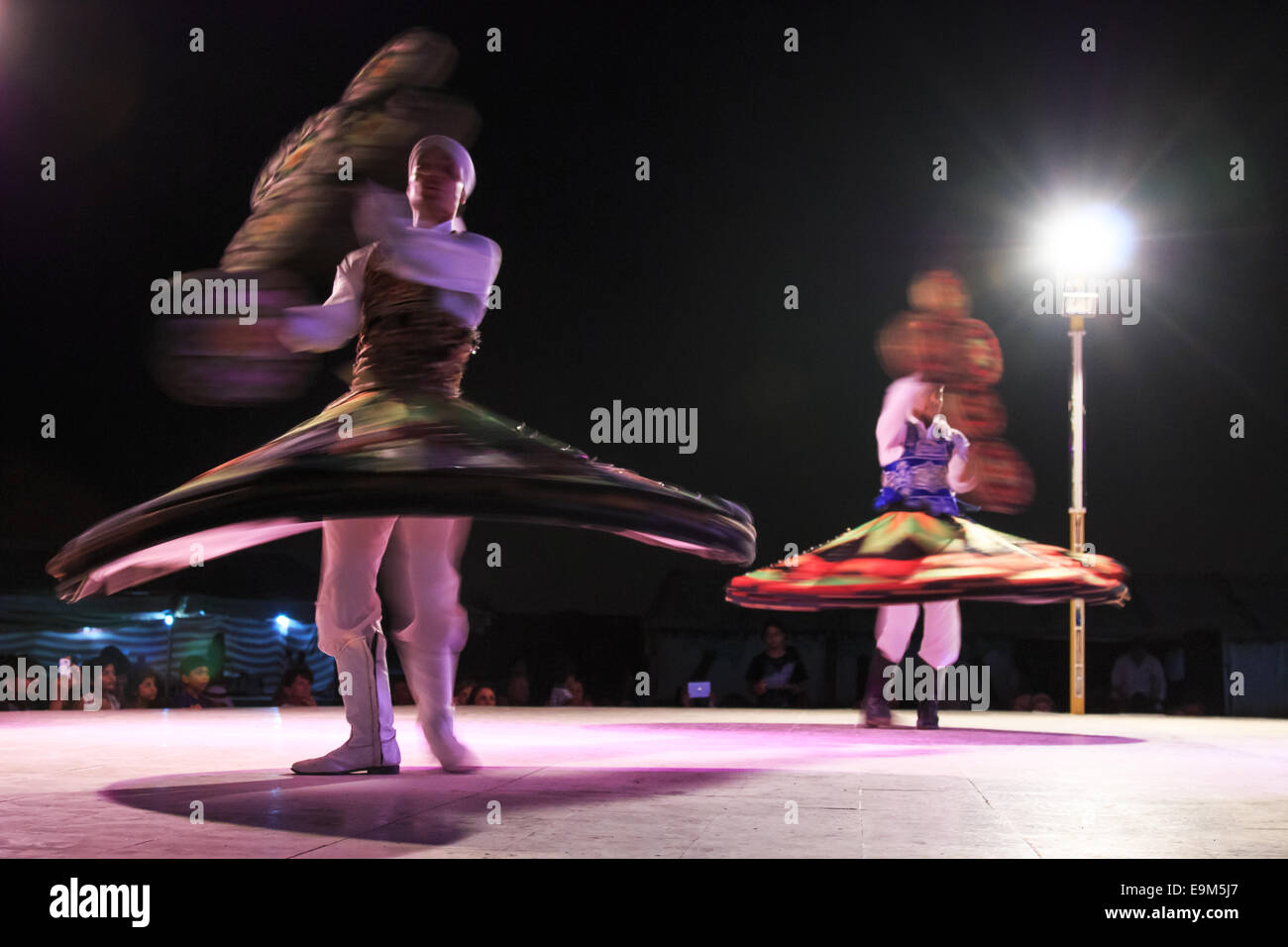 Dubai, United Arab Emirates - October 9, 2014: Arab dancer performing a 'turning dance' Stock Photo