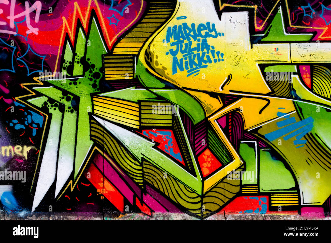 Graffiti street art Berlin Wall urban star colour Stock Photo