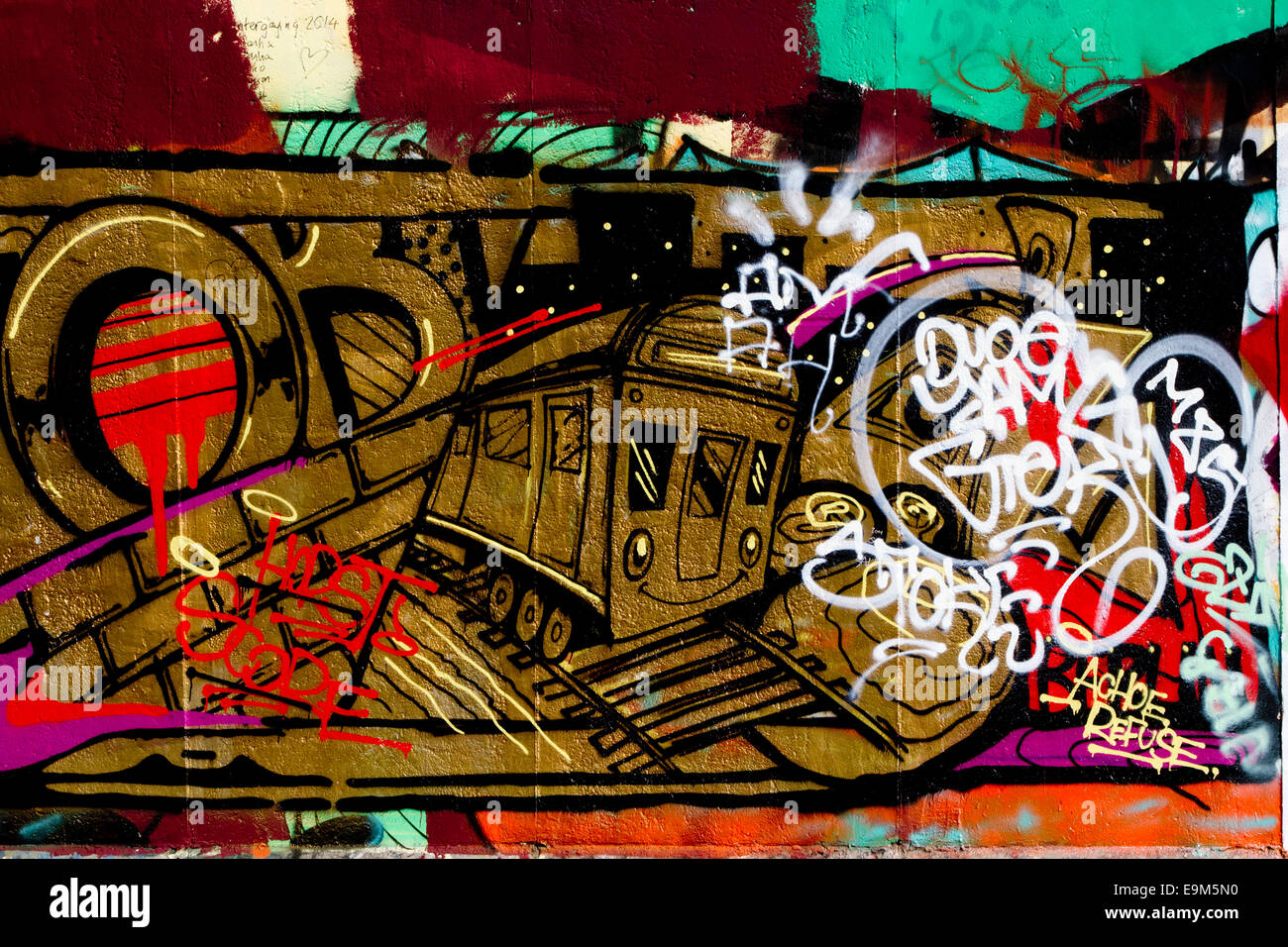 Graffiti street art Berlin Wall train tags colour Stock Photo