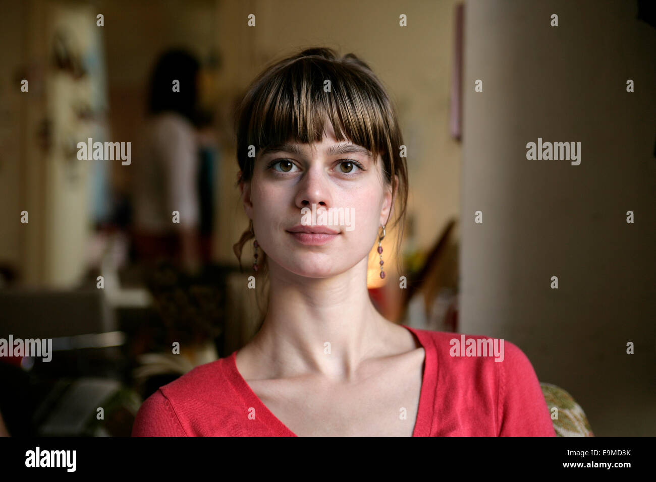 Woman with earrings hi-res stock photography and images - Alamy