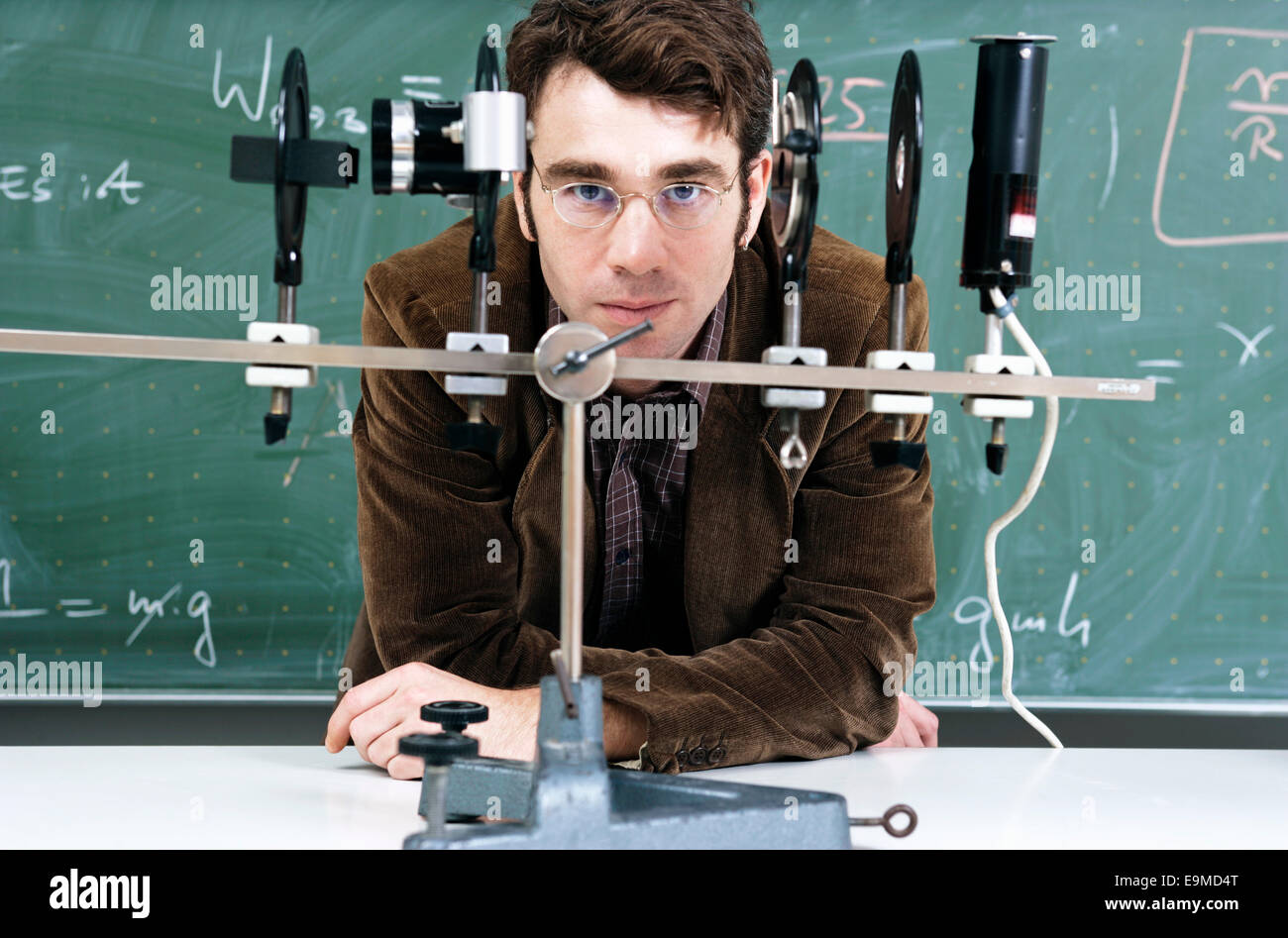 A teacher with an optical instrument Stock Photo Alamy