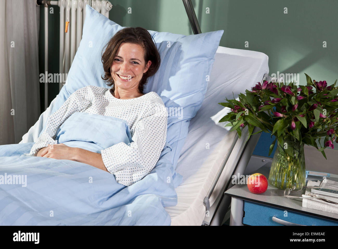 Woman reclining in hospital bed hi-res stock photography and images - Alamy