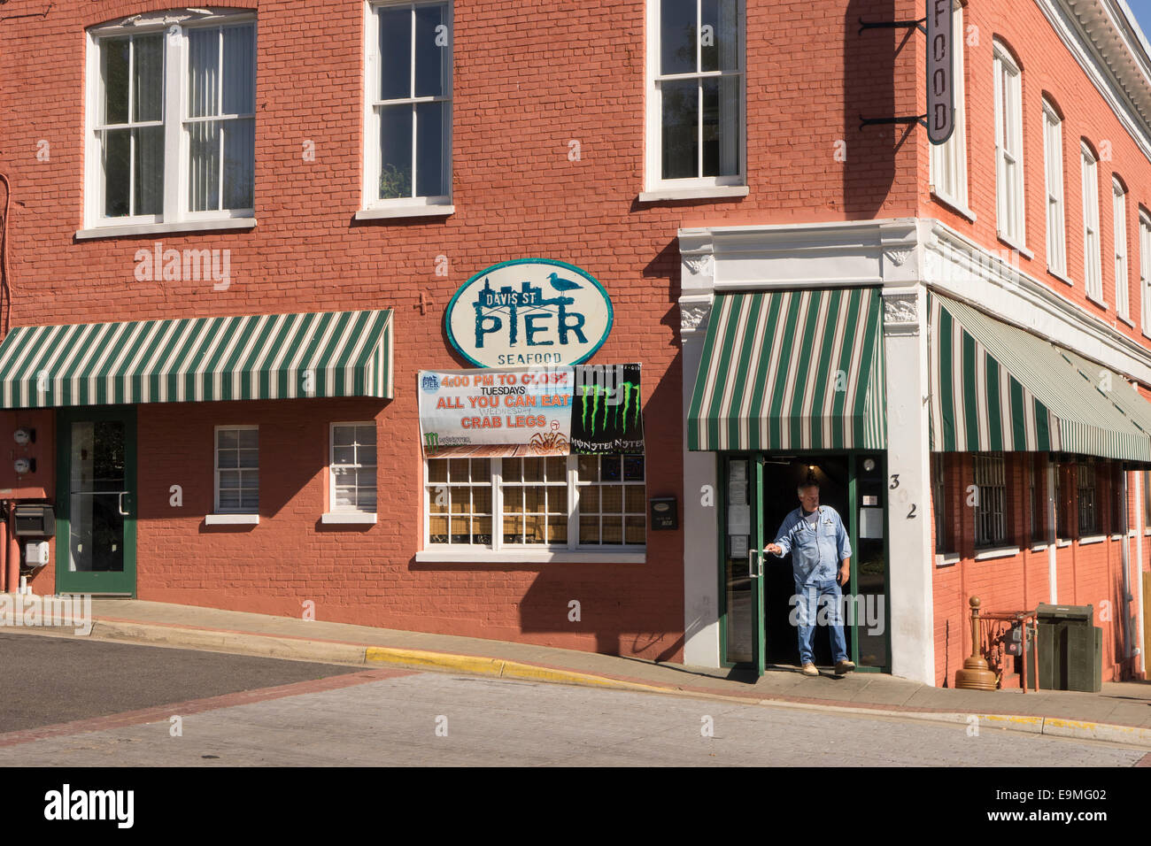 United States, Virginia, Culpeper, Man exiting a restaurant Stock Photo