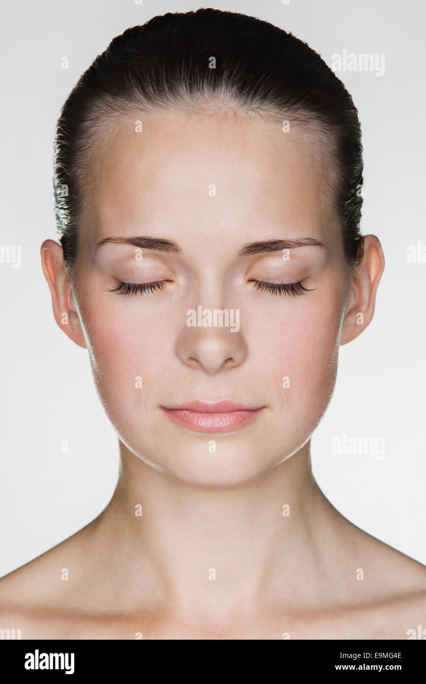 Woman white eyes closed not bathing hires stock photography and images