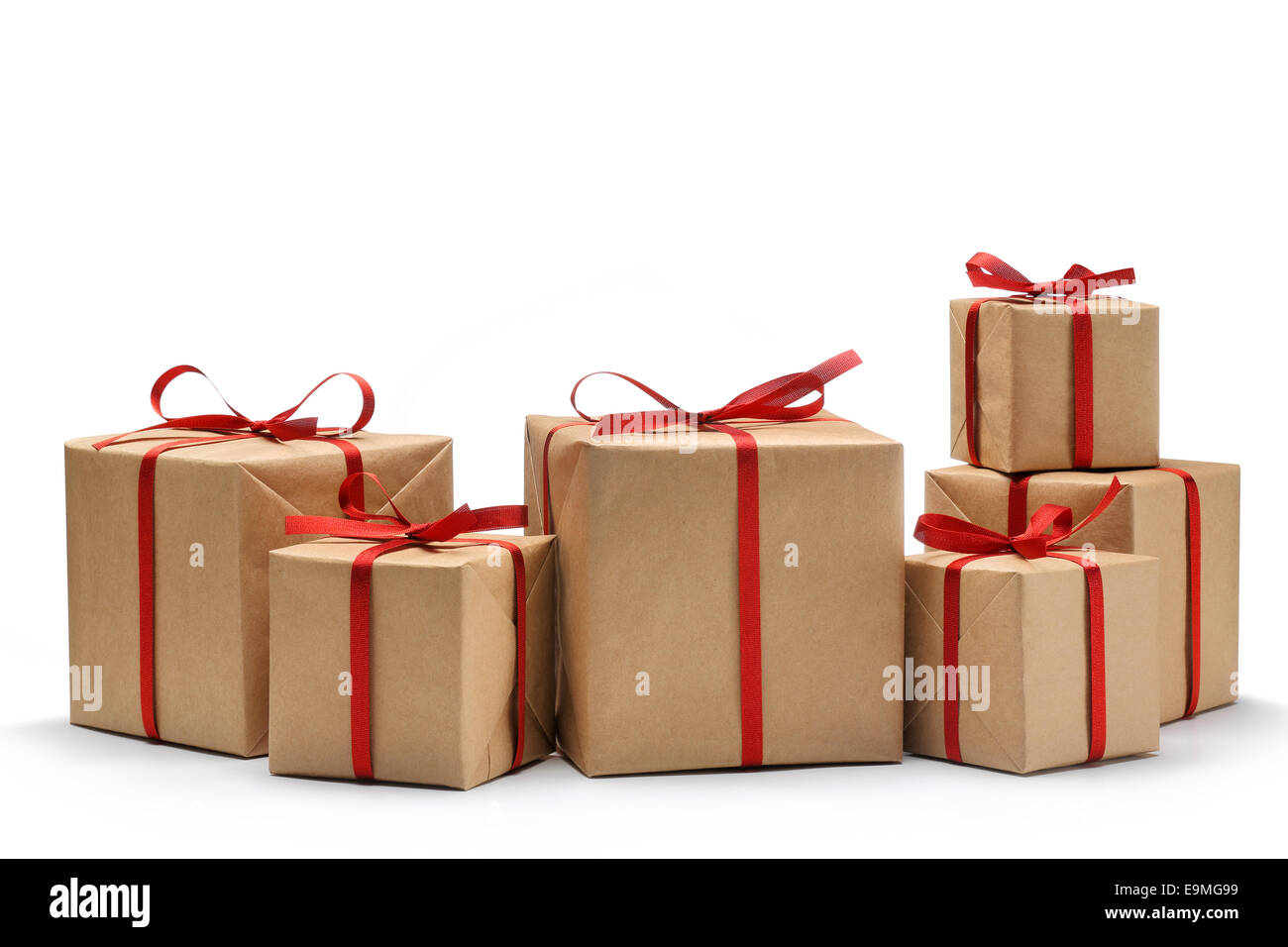 Gift box wrapped in recycled paper with ribbon bow Stock Photo