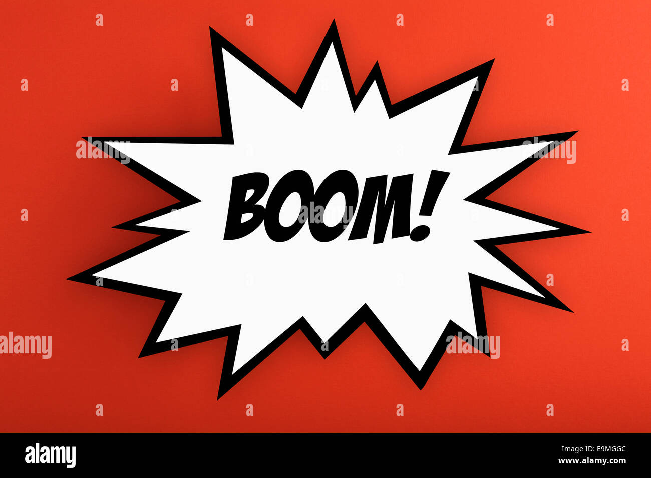 Exploding Boom! thought bubble against orange background Stock Photo