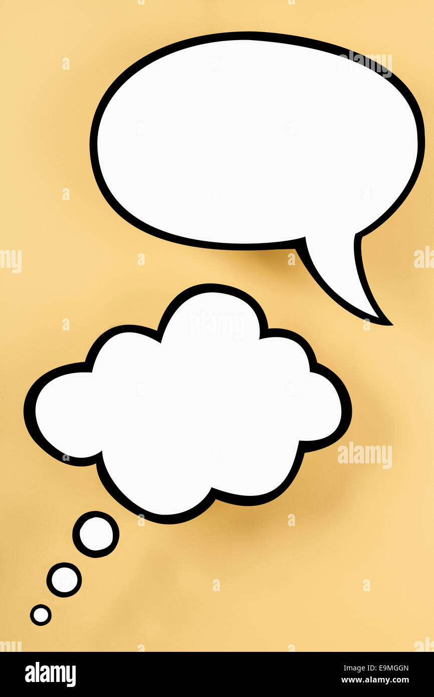 An empty speech bubble and empty thought bubble, yellow background Stock Photo