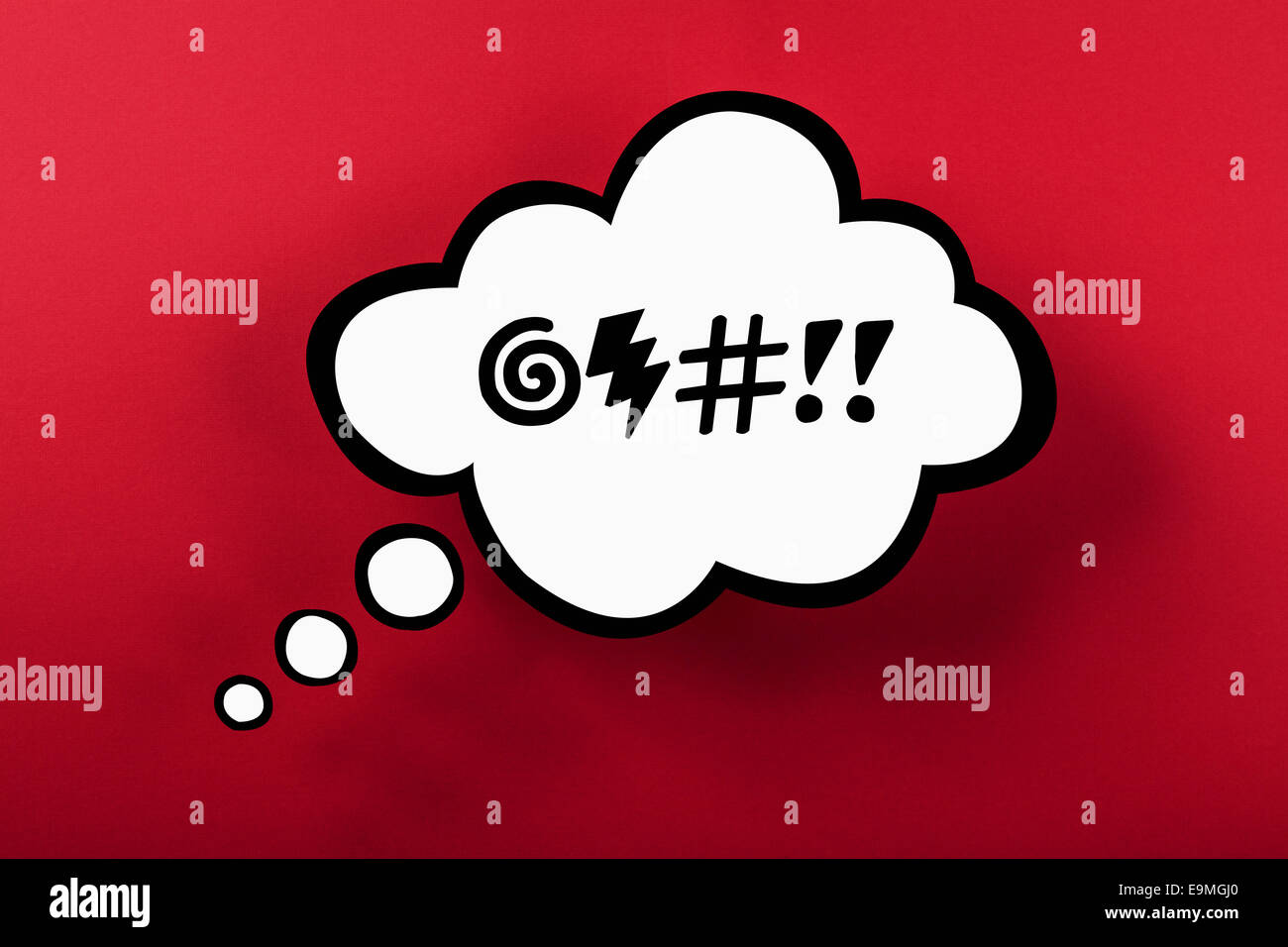 Swear word thought bubble against red background Stock Photo