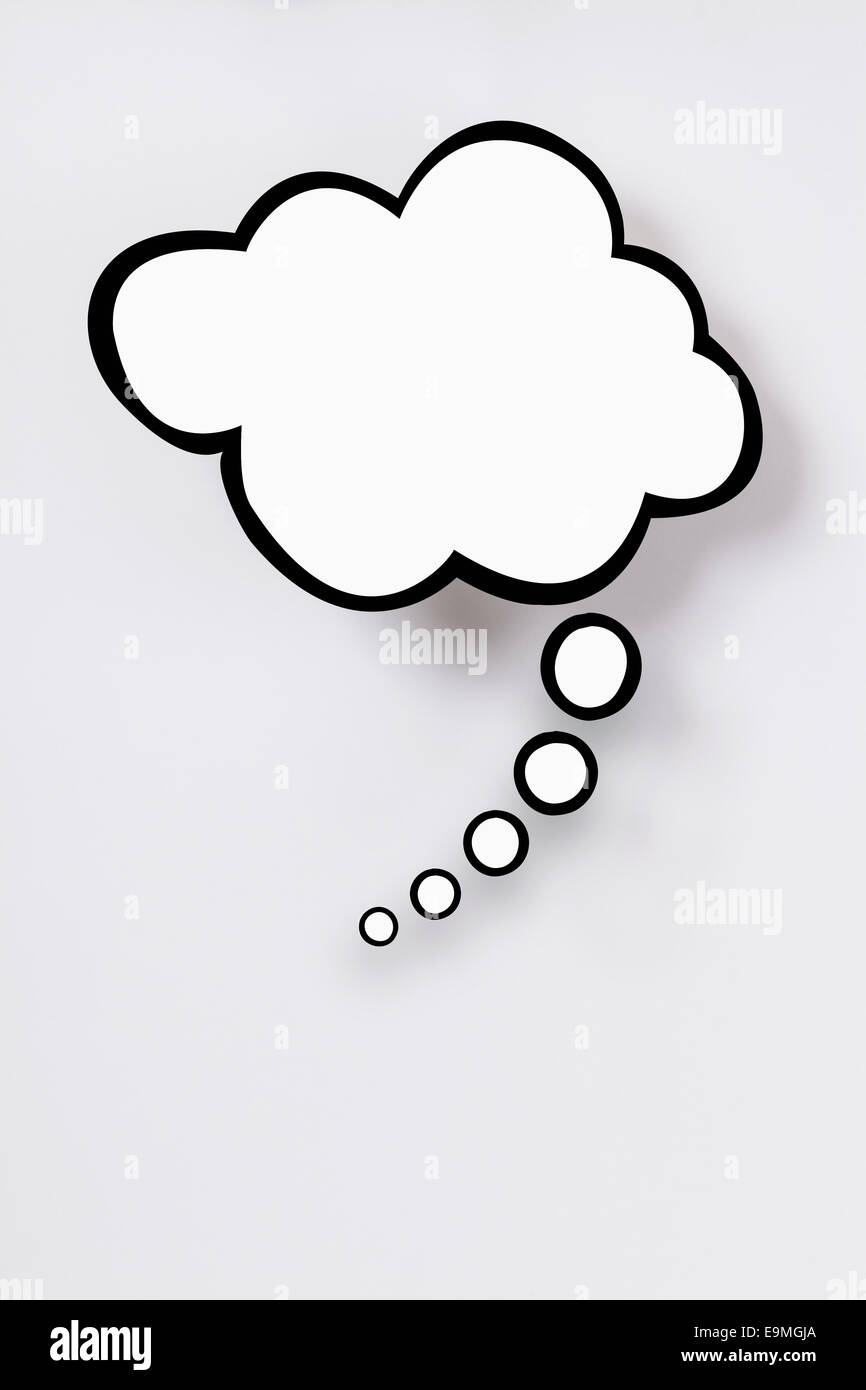 Blank thought bubble against gray background Stock Photo