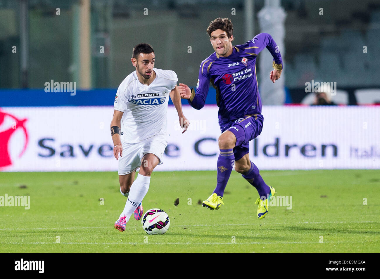 Firenze, Italy. 29th Oct, 2014. Bruno Fernandes (Udinese), Marcos Alonso  Mendoza (Fiorentina) Football/Soccer : Italian "Serie A" match between  Fiorentina 3-0 Udinese at Artemio Franchi Stadium in Firenze, Italy .  Credit: Maurizio