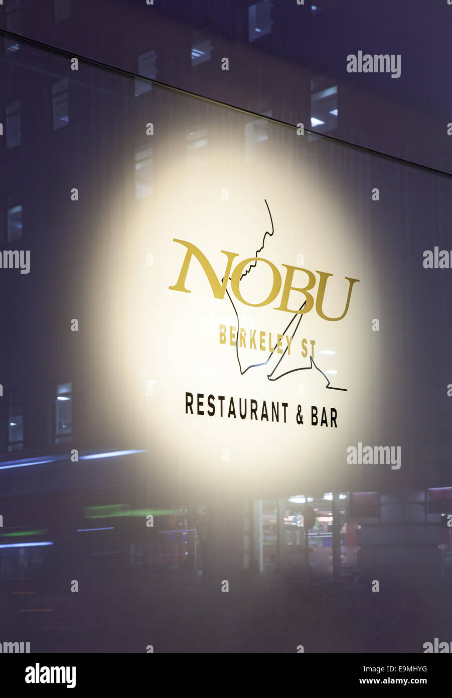 Nobu illuminated restaurant sign close up at night Stock Photo