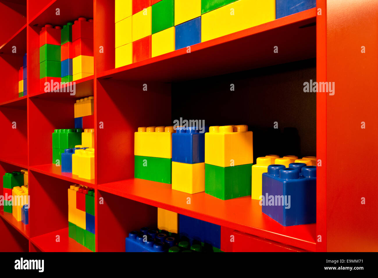 detail of colored cubes in the red shelf Stock Photo