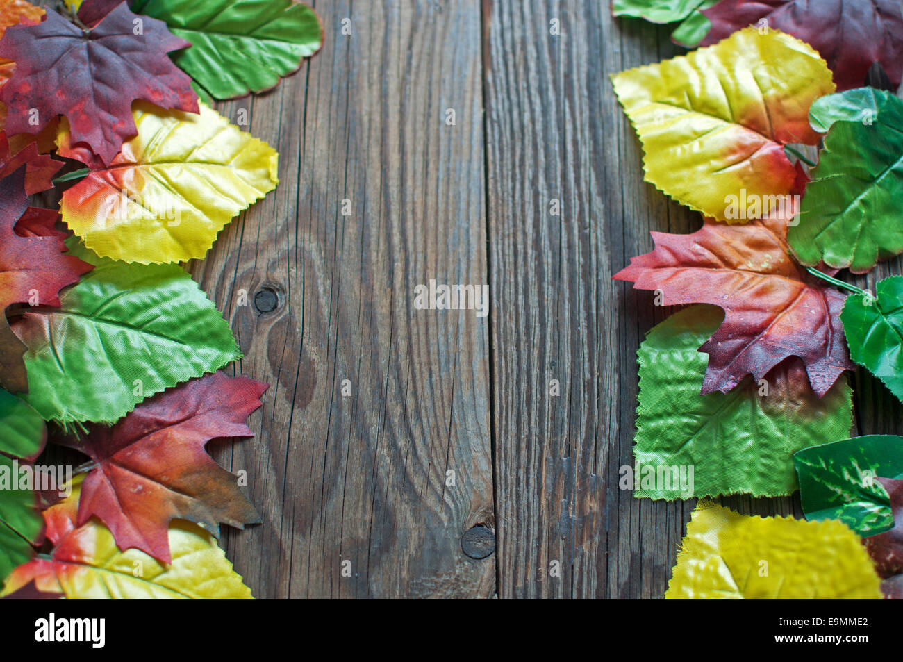 Wood background with autumn leaves frame Stock Photo - Alamy