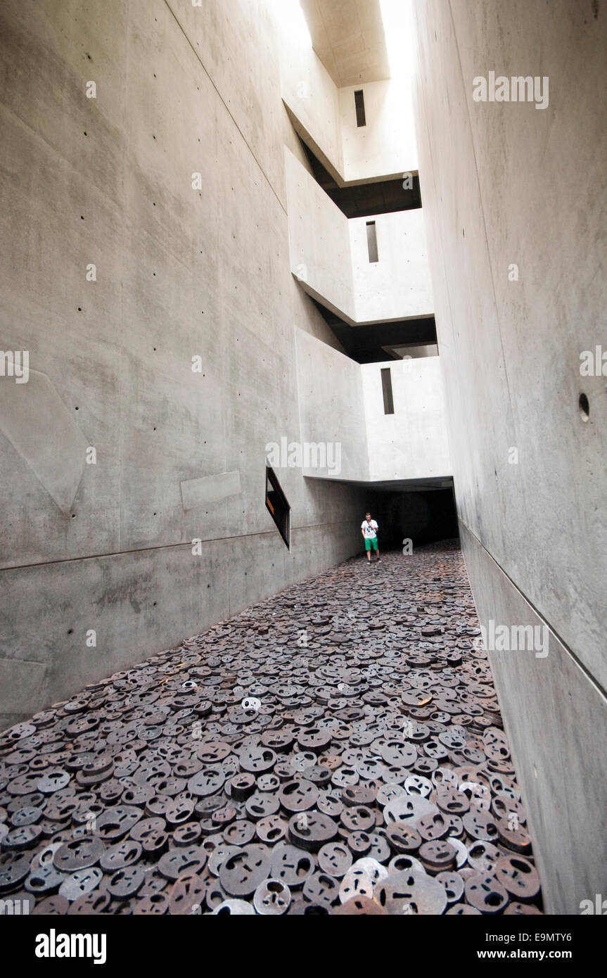 Germany, Berlin, Jewish Museum,  Daniel Libeskind, Memory Void Room, Installation, Shalechet Fallen Leaves by Menashe Kadishman Stock Photo