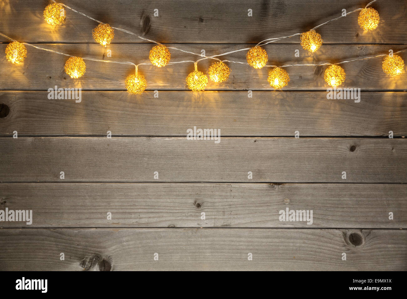 Christmas light on wood background Stock Photo