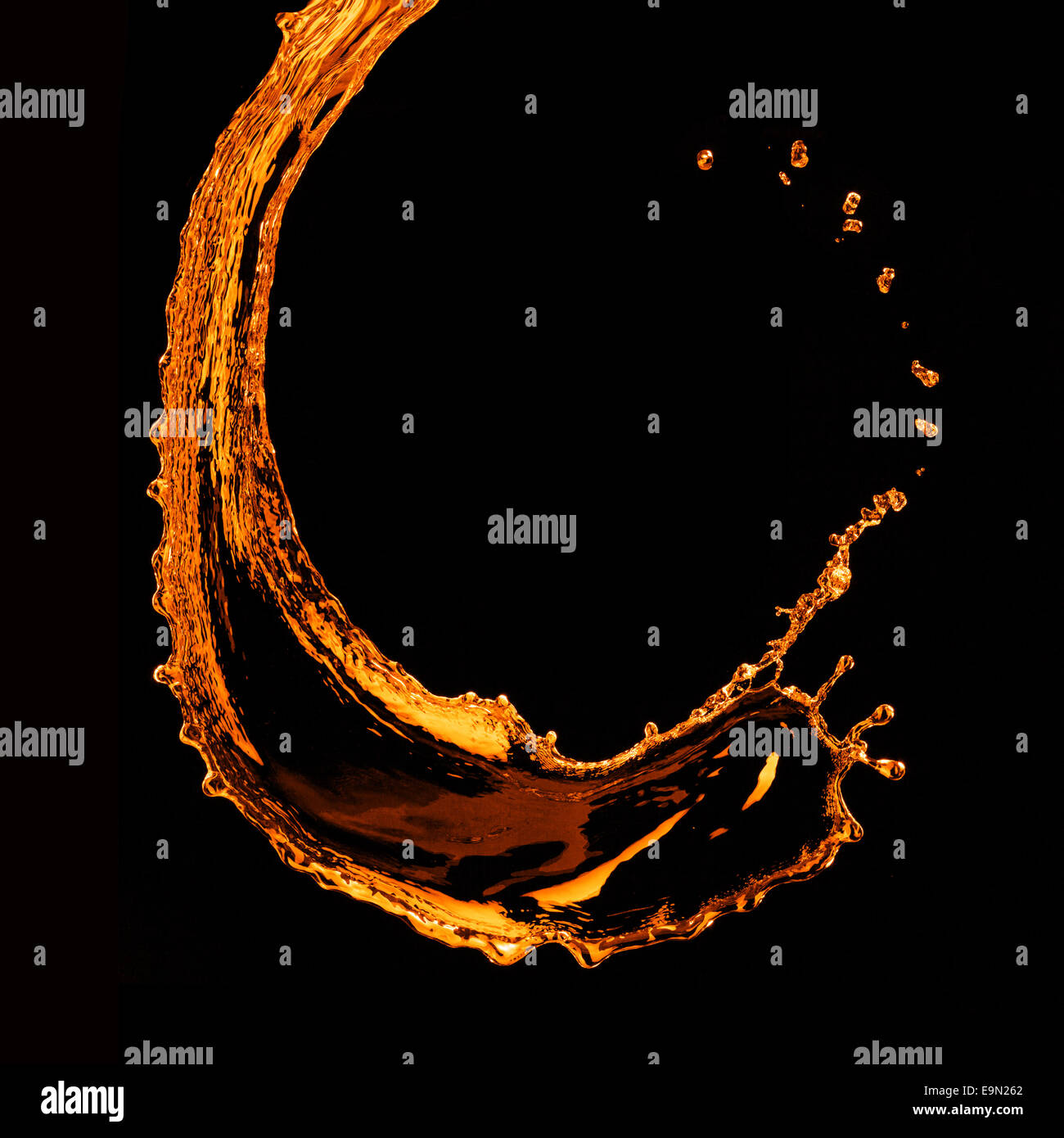 orange water splash isolated on black Stock Photo Alamy