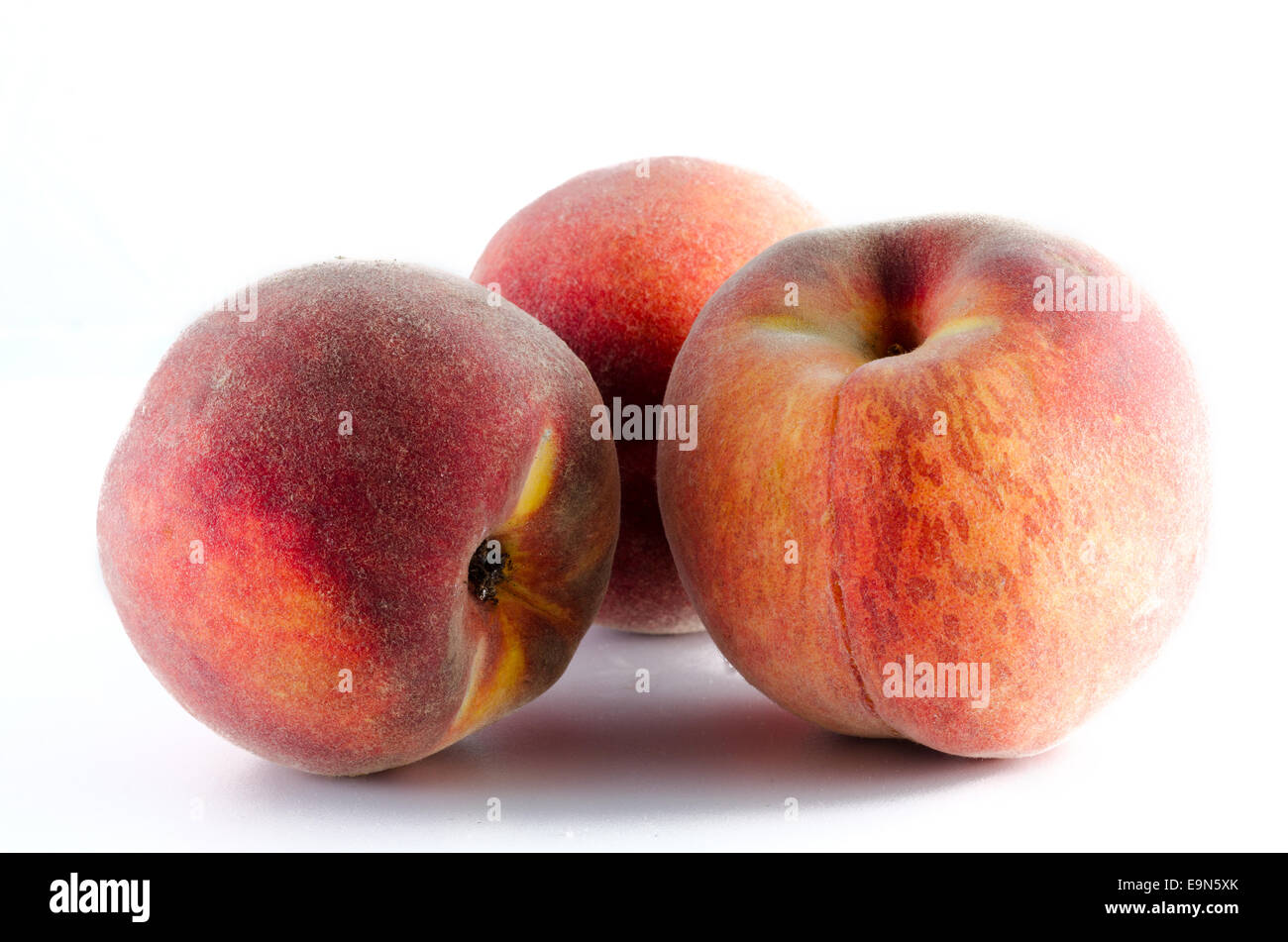 Three organic ripe peaches hi-res stock photography and images - Alamy
