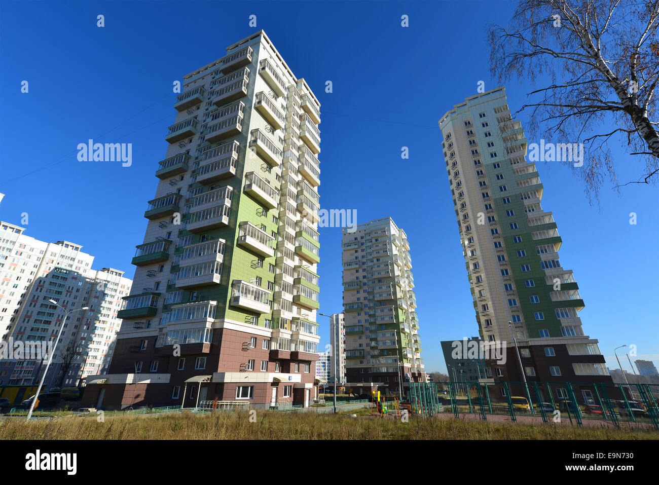 High residential buildings on the background of blue sky Stock Photo ...