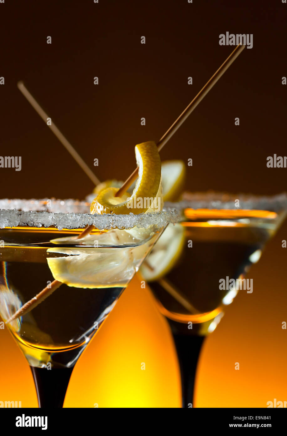 cocktail with lemon , focus on a foreground Stock Photo