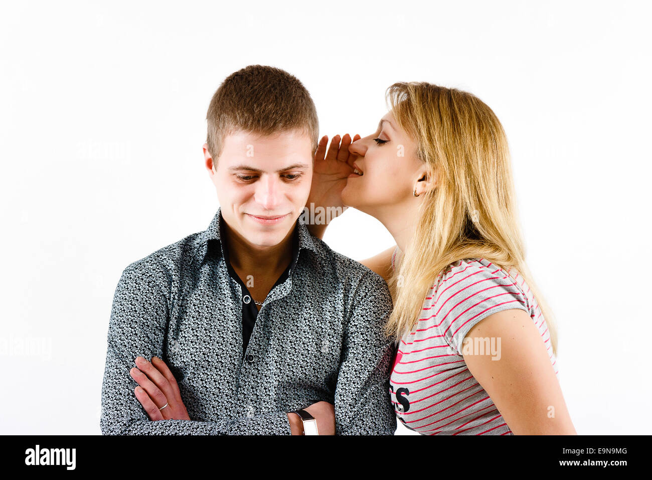 young woman whispering a secret Stock Photo - Alamy