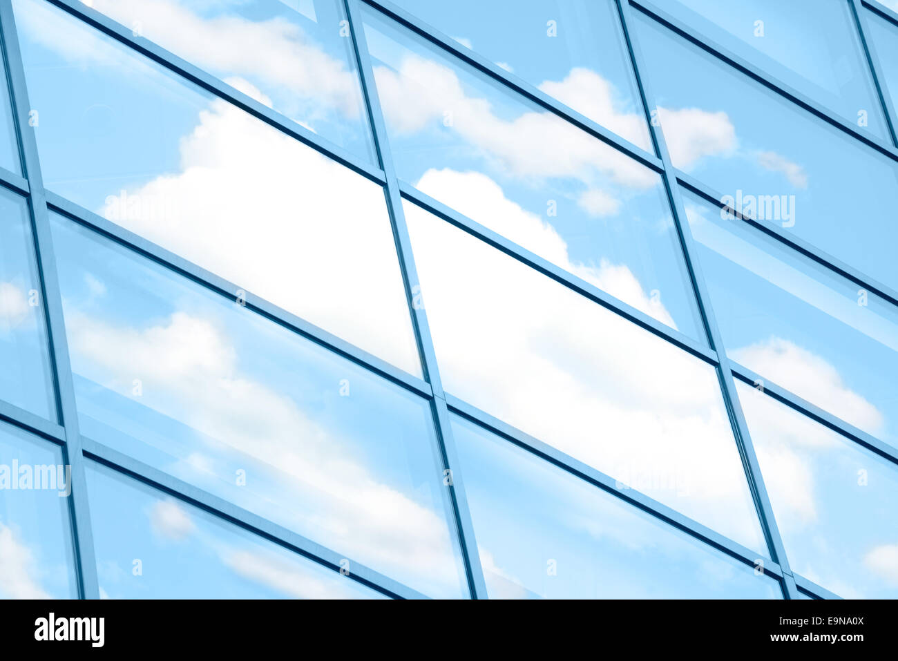 Clouds reflected in windows Stock Photo - Alamy