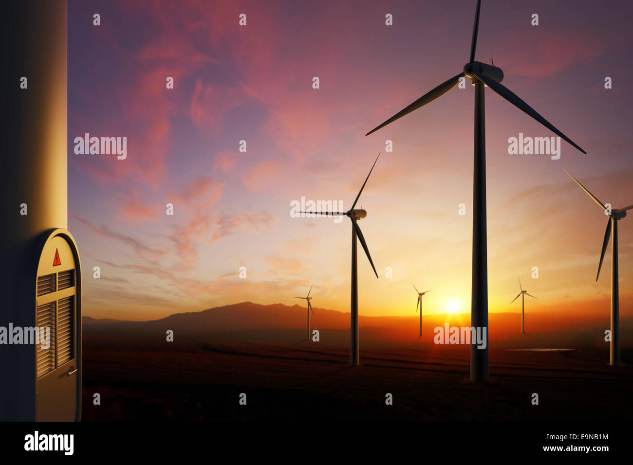 Wind Turbine farm with moody sunset (focused on nearest turbine on right) - 3D artwork Stock Photo