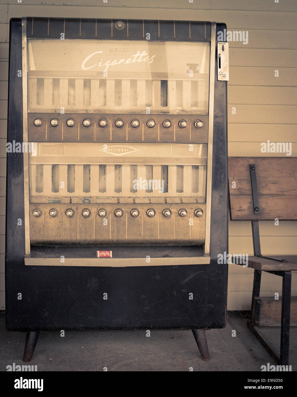 An old cigarette coin-op vending machine. Stock Photo