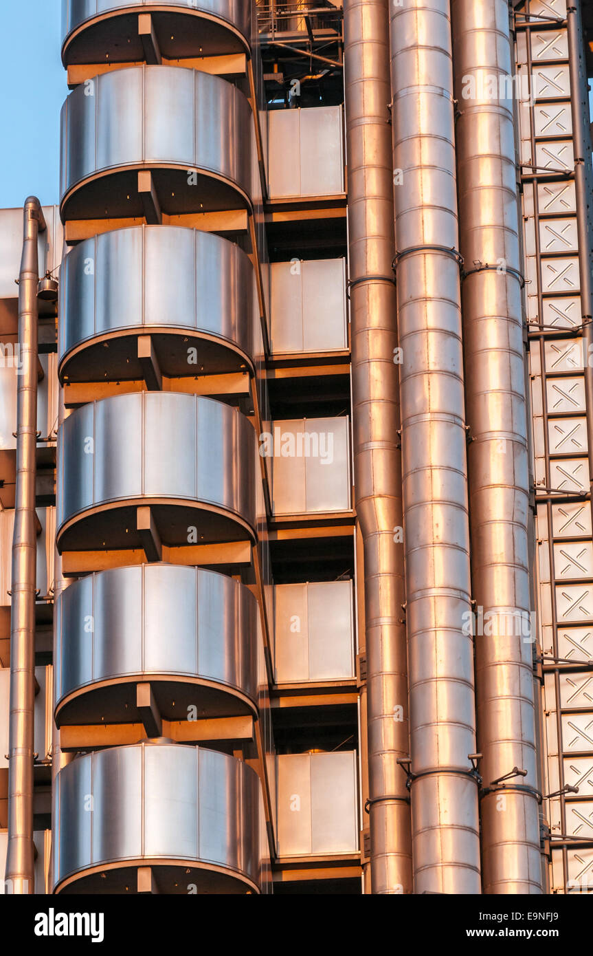 The evening sun warms the exterior of the Lloyd's Building in London England. Stock Photo