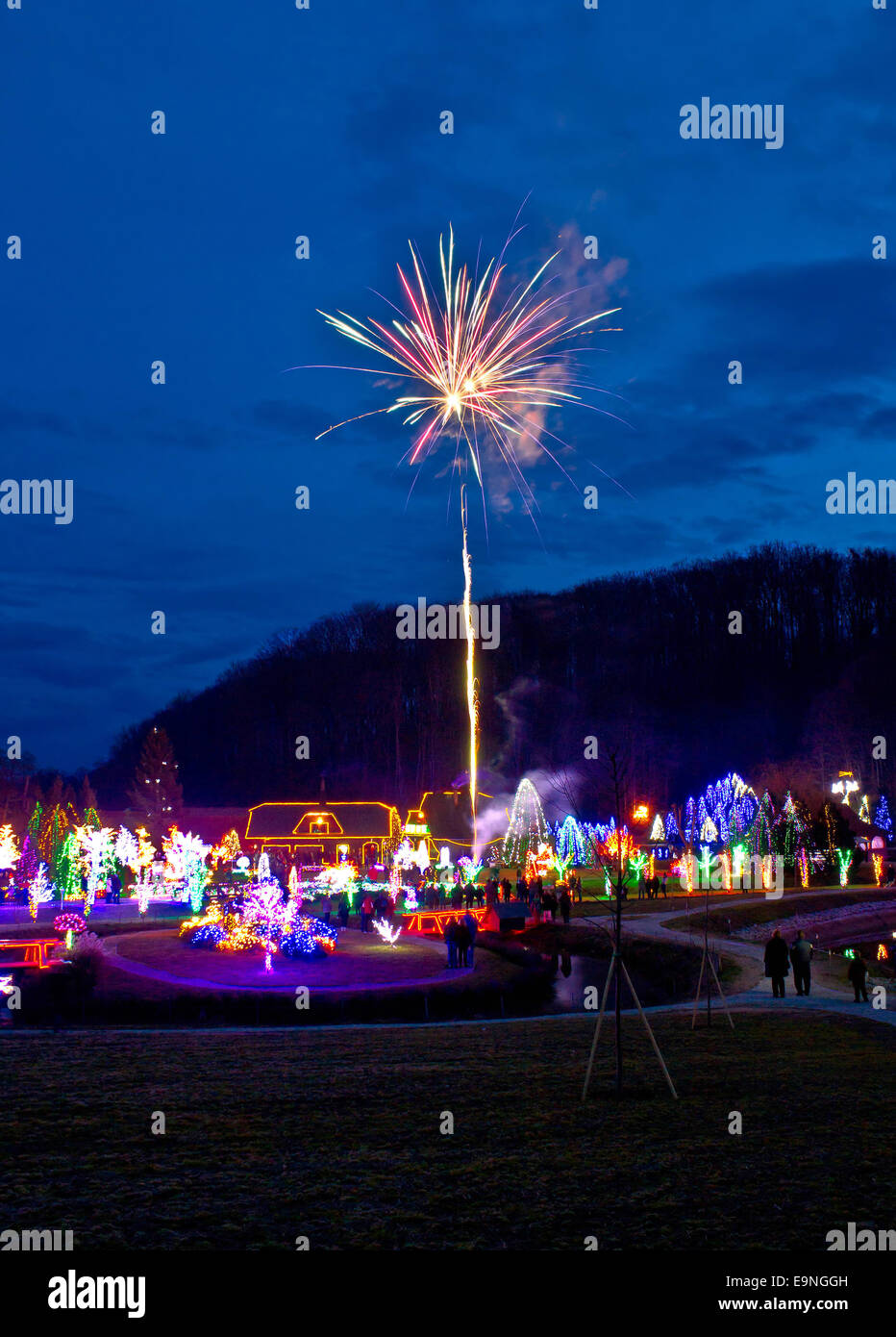 Village in Christmas lights fireworks Stock Photo