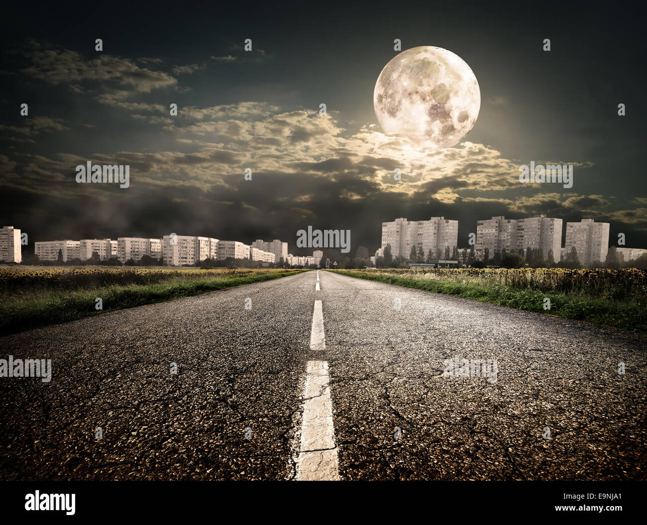Highway to district under the moon. Elements of this image furnished by NASA Stock Photo