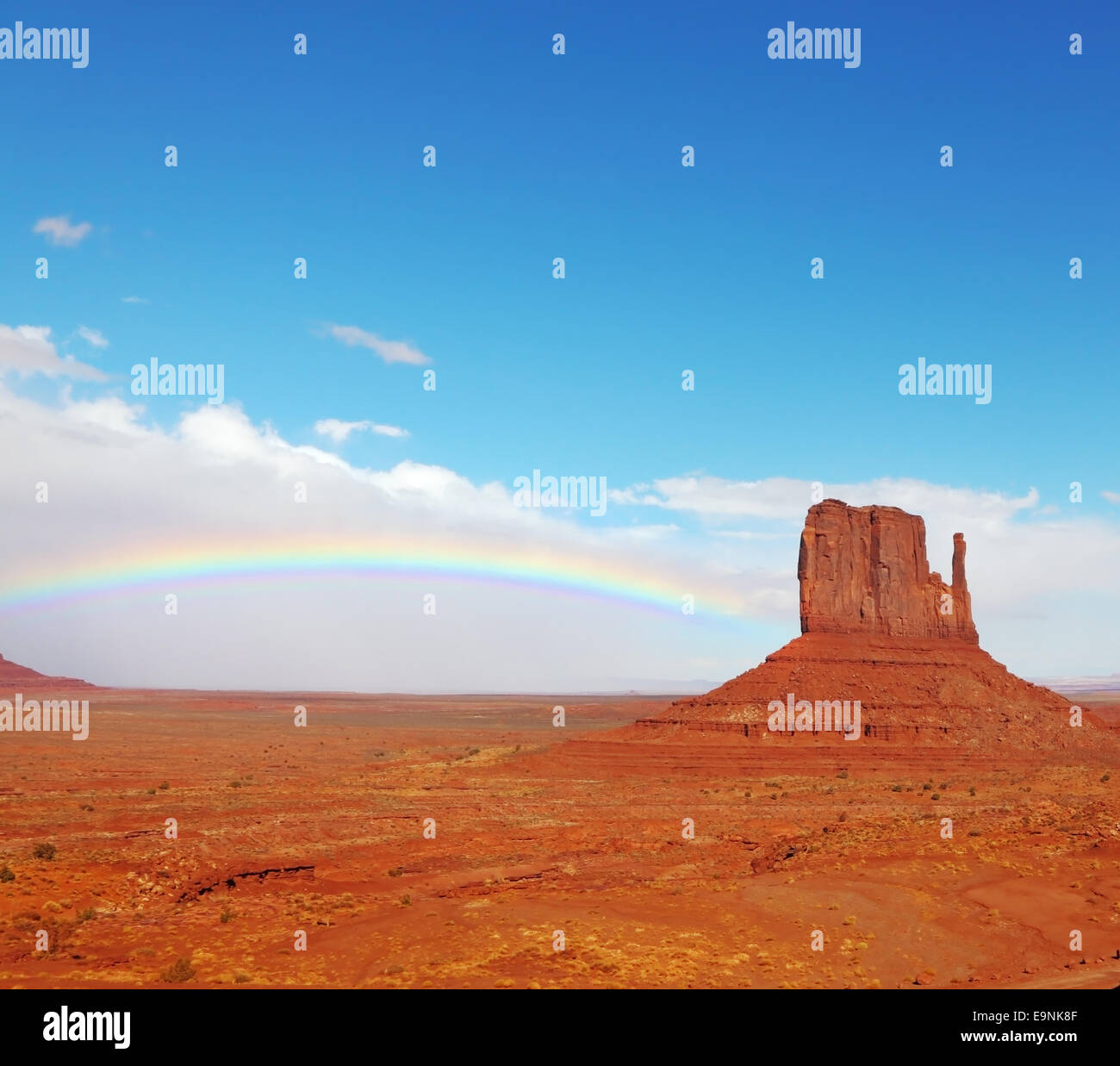 Rainbow in desert Stock Photo - Alamy