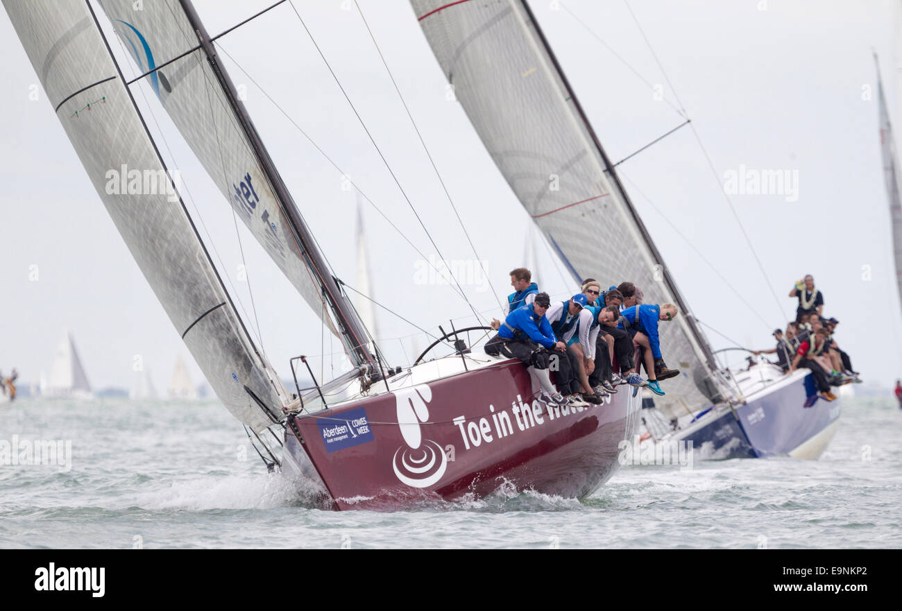 Toe in the Water Too, racing in IRC class 0 during Aberdeen Asset Management Cowes Week. The event began in in 1826 and plays a  Stock Photo