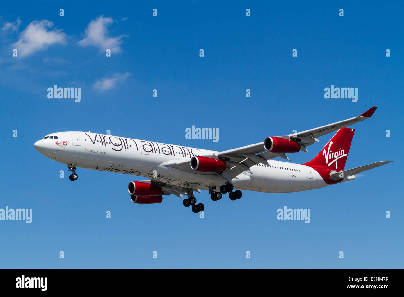 Virgin Atlantic Airbus A340-300 plane, G-VELD, African Queen, on its approach for landing at London Heathrow, England, UK Stock Photo
