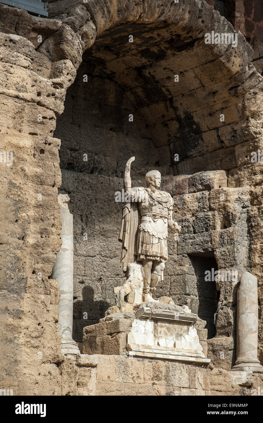 Statue in the scaenae frons of the Roman Théâtre antique d'Orange / Ancient Theater of Orange, Vaucluse, France Stock Photo