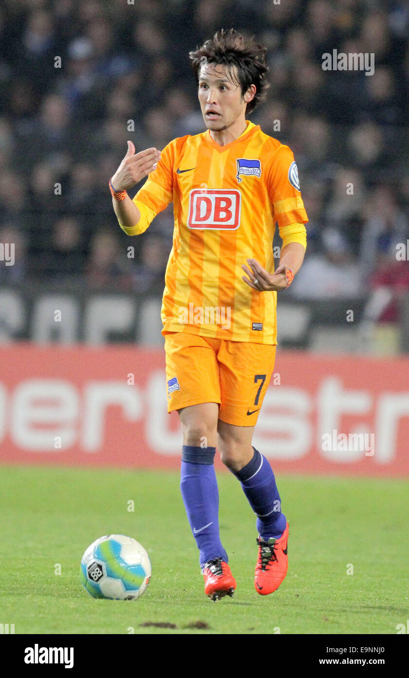 Bielefeld, Germany. 28th Oct, 2014. Berlin's Hajime Hosogai in action during the DFB second round match between Arminia Bielefeld and Hertha BSC in Schueco Arena in Bielefeld, Germany, 28 October 2014. Photo: OLIVER KRATO/dpa/Alamy Live News Stock Photo