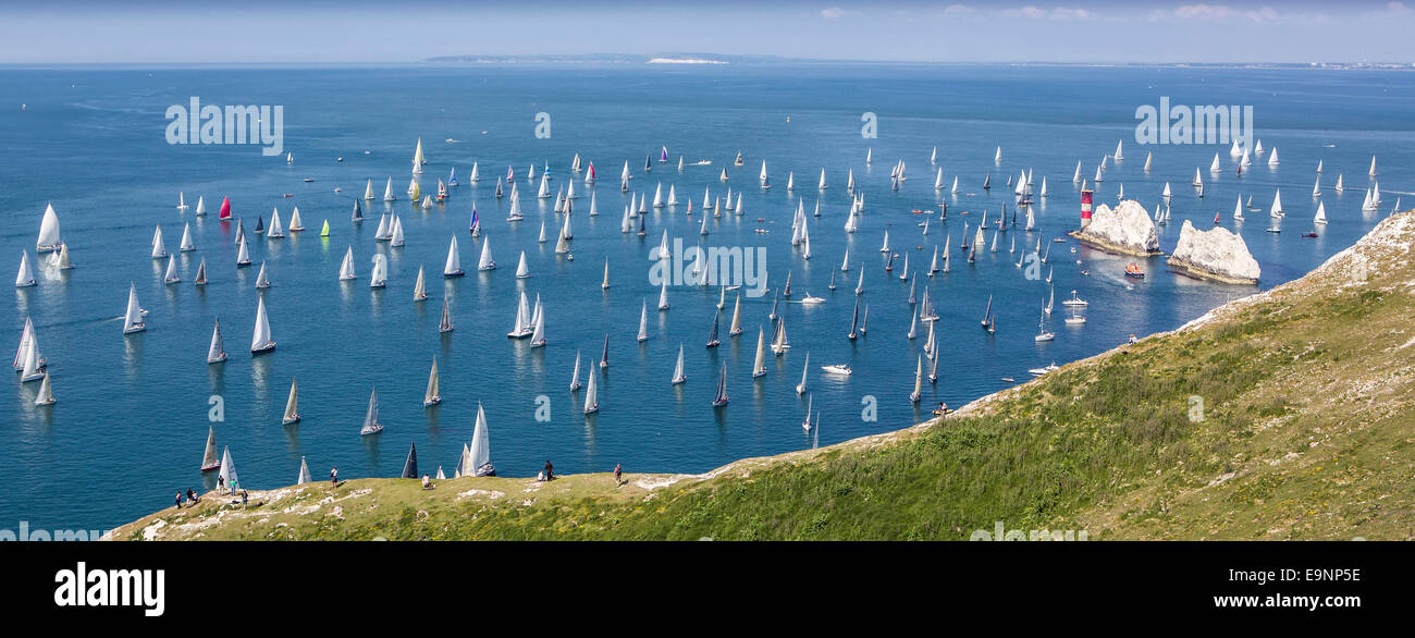 Yachts pass the Needles heading for St Catherine's Point during the 2014 JP Morgan Asset Management Round the Island Race. Stock Photo