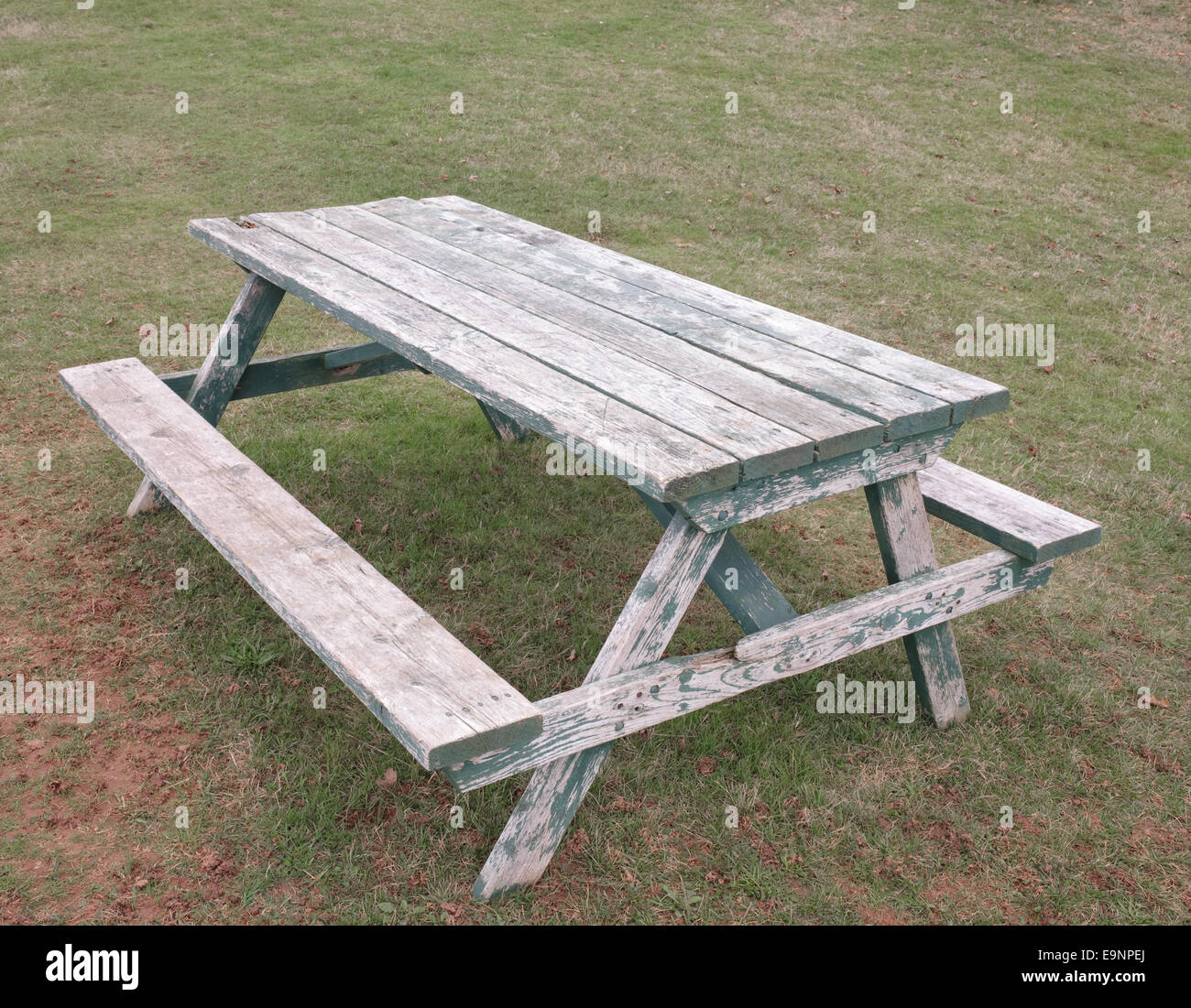 Weathered picnic table on beaten down grass Stock Photo - Alamy